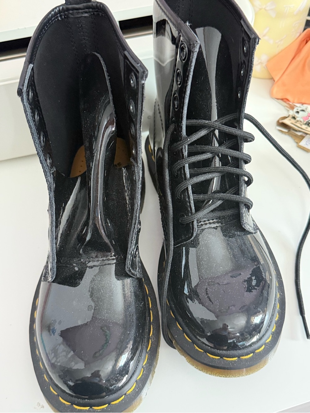 Dr. Martens Black Patent Lace-Up Combat Boots with Yellow Stitching
